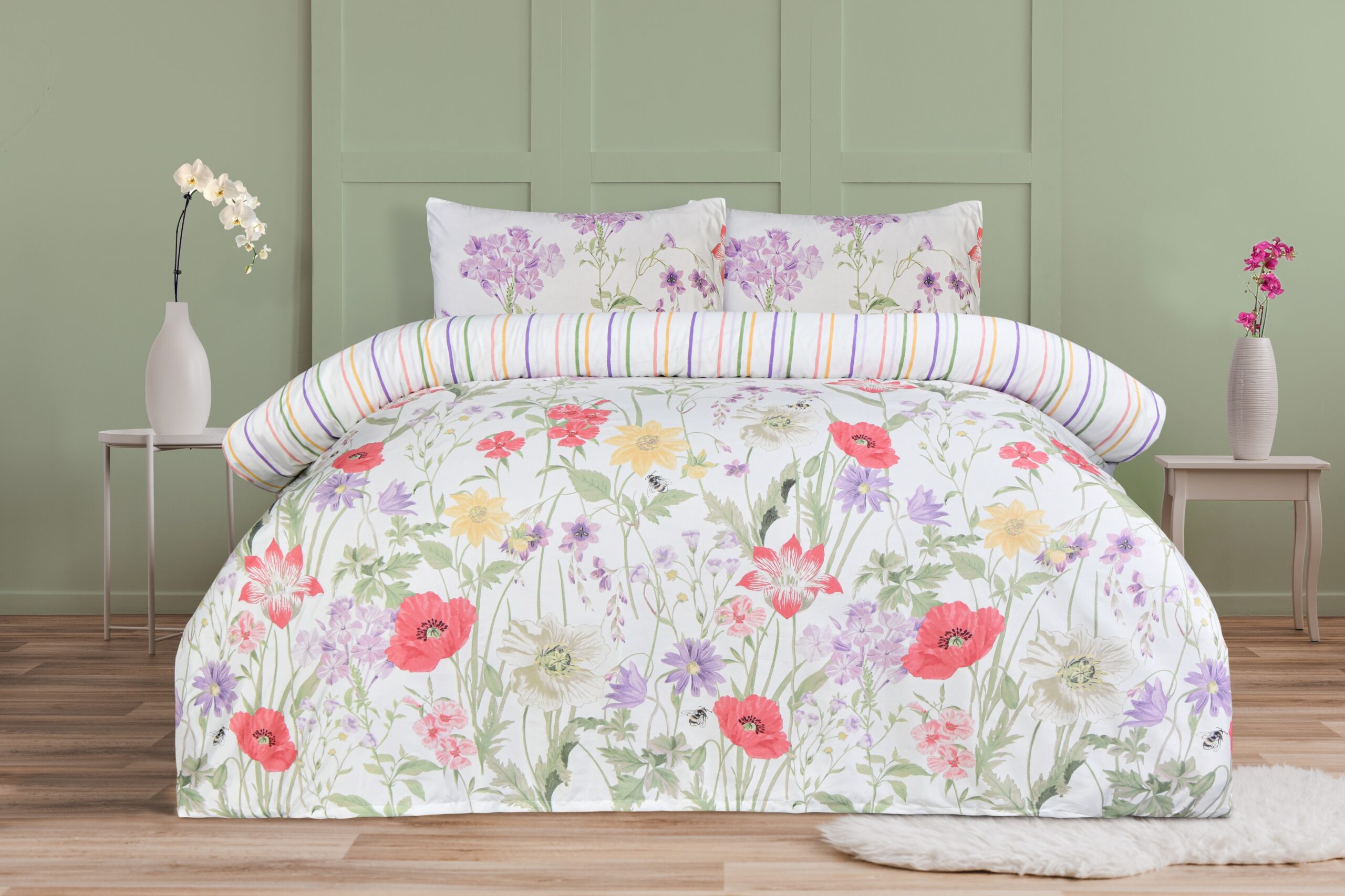 White pillow on blue bedding on king size bed in fashionable bed Duvet